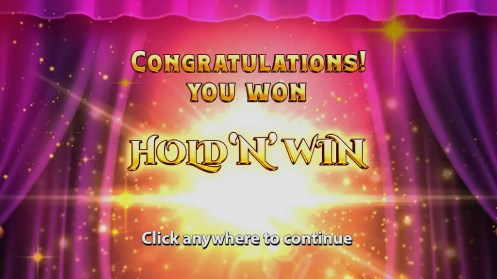 Tampilan visual mesin slot Mega Fortune Hold ‘n’ Win dengan simbol buah klasik dan koin emas.